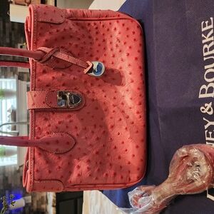 Dooney & Bourke Pink Satchel Handbag with Structured Design and Top Handles